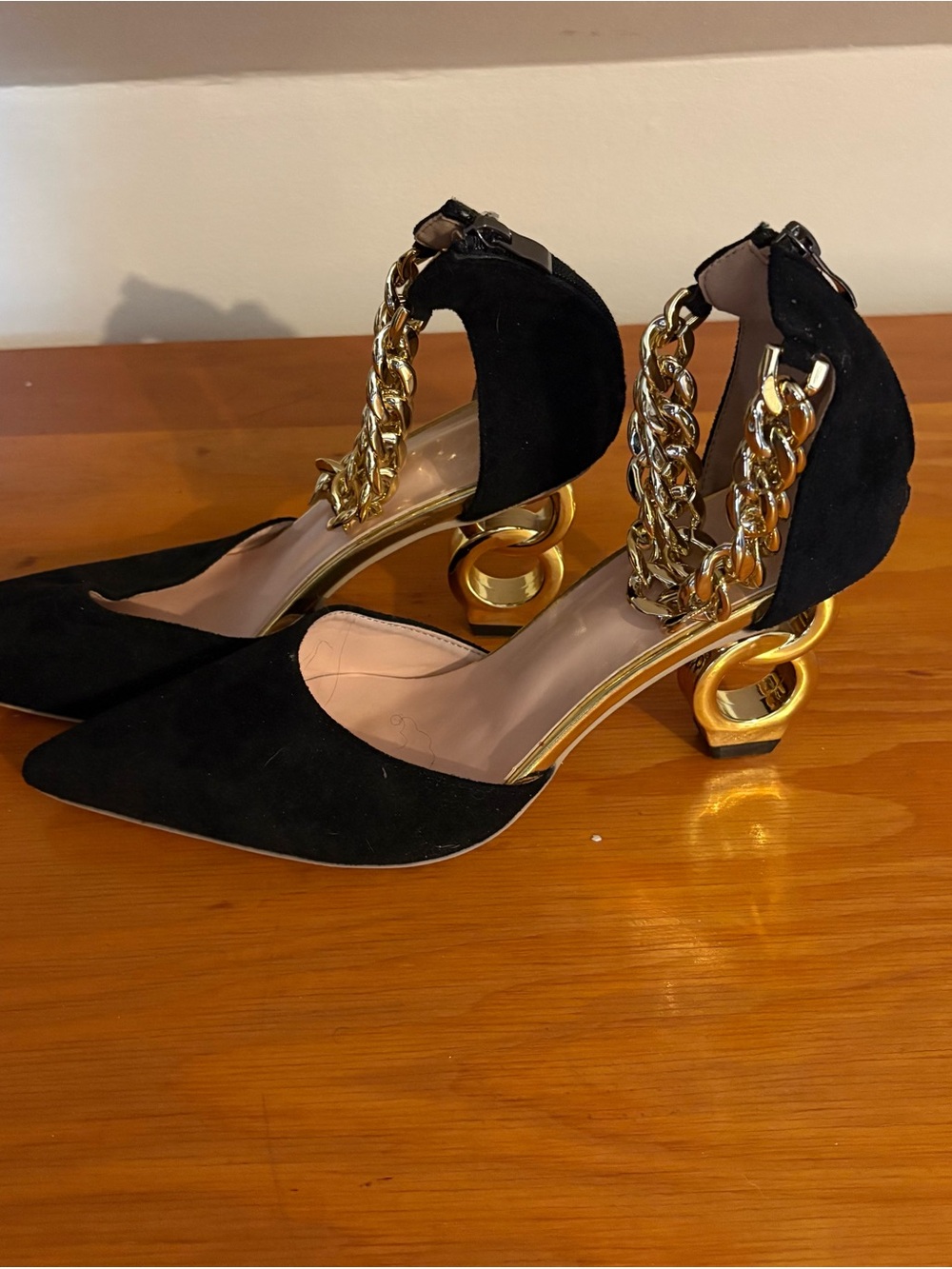 Black Suede Pointed-Toe Heels with Gold Chain Detail